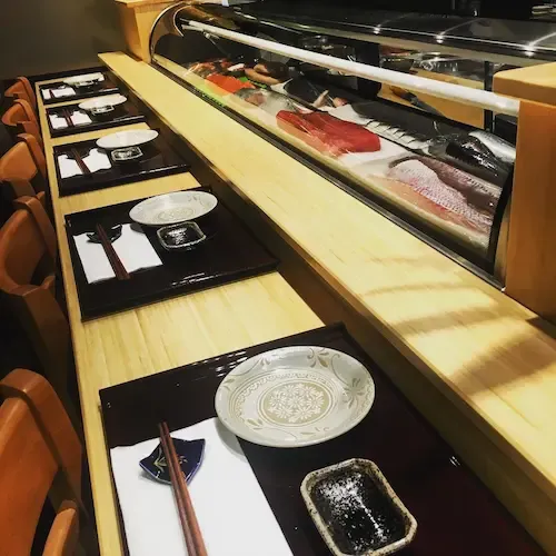 Inside the restaurant, counter seating area at a top down view
